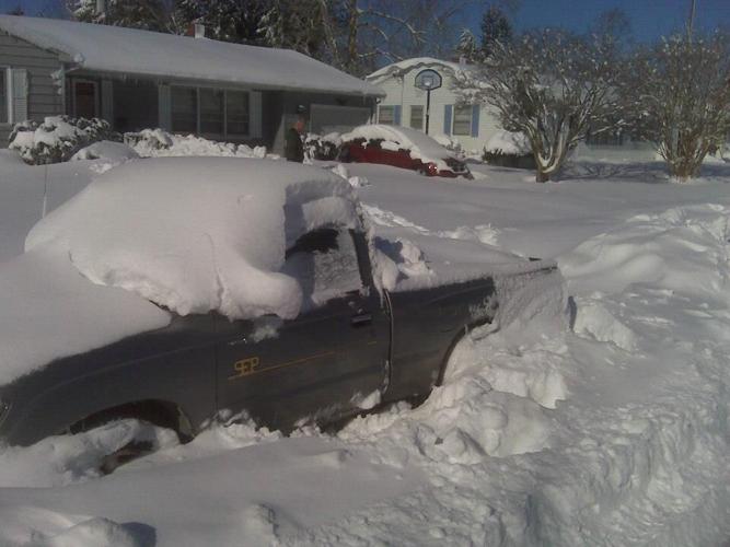 Truck Covered in Snow