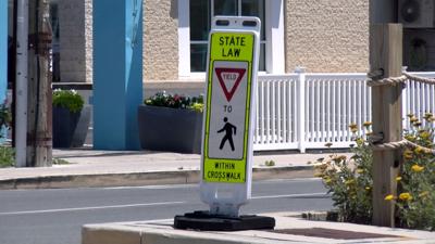 Dewey beach pedestrian sign