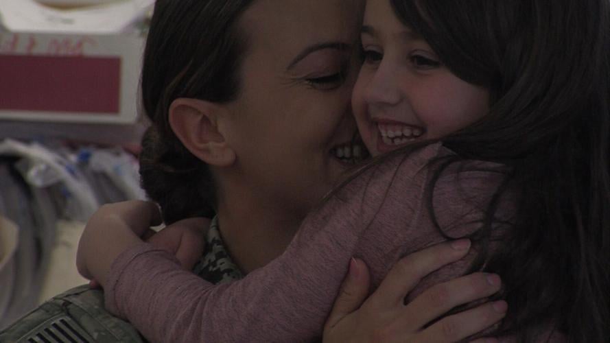 Military Mom Surprises Daughters at School After Serving Overseas