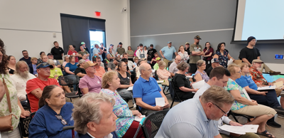 A packed room of community members during the Harrington city council meeting.