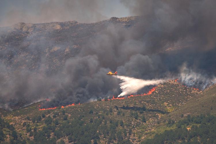 Europe battles fast-moving wildfires sweeping across Spain and France, in photos