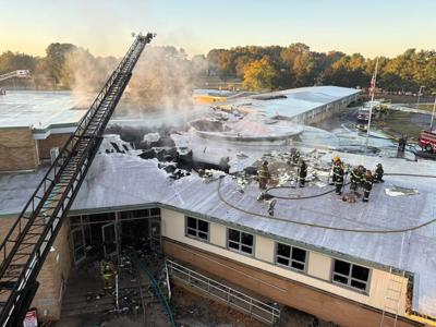 Smoke emanating from the LuLu M. Ross Elementary School.