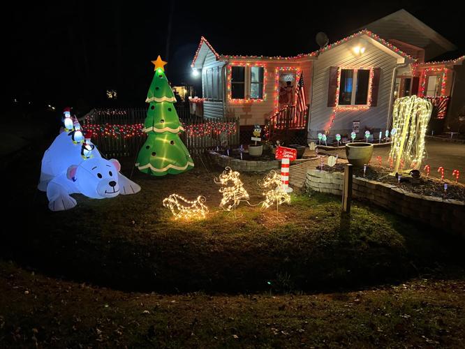 Thomas, Woody, and Donna McGuire's outdoor Christmas display.