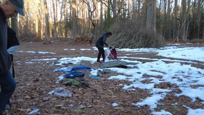 Volunteers investigate encampments