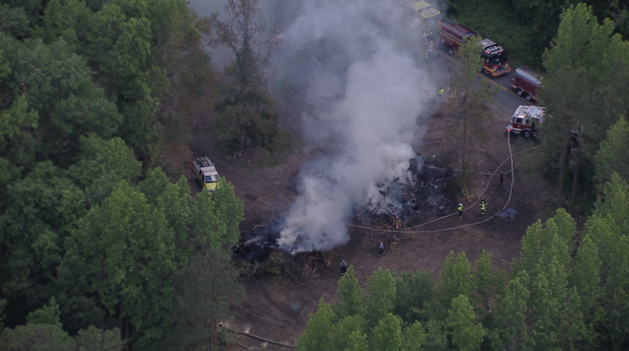 Abandoned house destroyed after brush pile burning in Eden