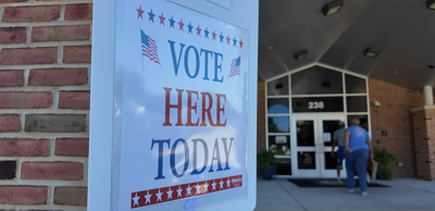 A sign reads "Vote Here Today" at polling place in Kent County.