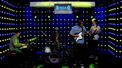 Band of 4 members playing musical instruments on the MSA stage
