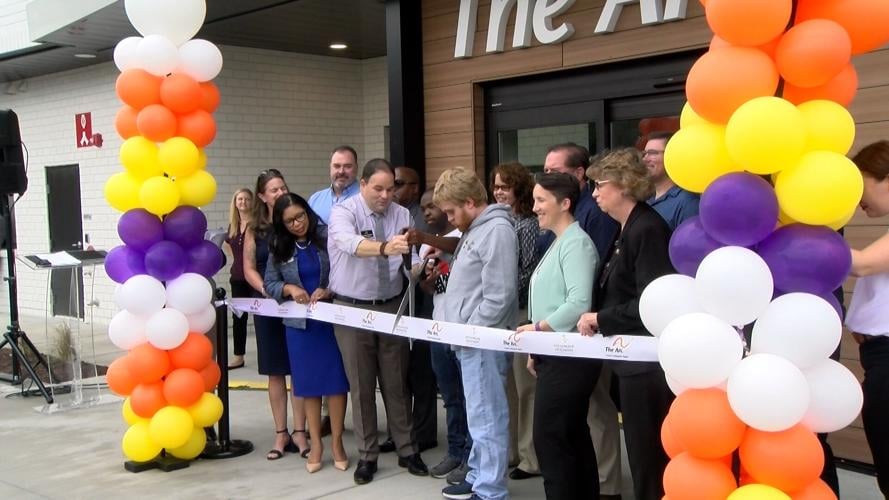 Ribbon Cutting The Arc