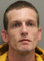 Harrington Man Arrested on Gun and Drug Charges After Search Warrant