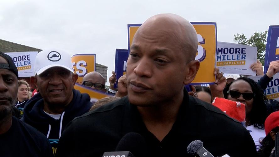 Governor Wes Moore takes questions from a gaggle of reporters.