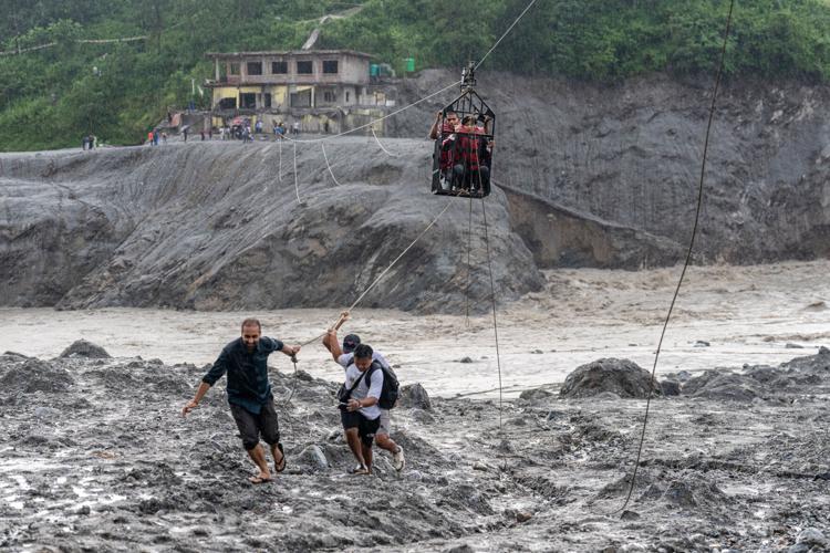 Photos show aftermath of flash floods in Nepal