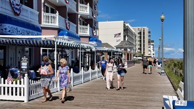 Beachgoers walking the boardwalk in Rehoboth Beach on Sept. 7, 2026.