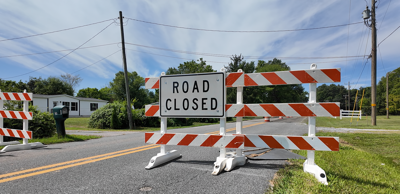 Road closed sign placed on Central Church Road before the intersection with Kenton Road.