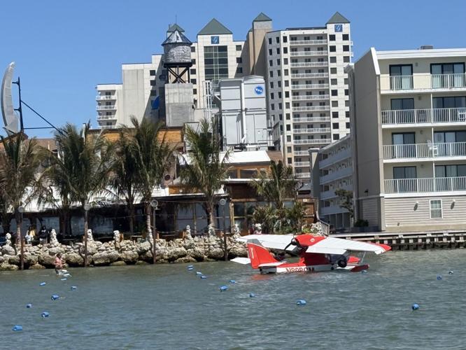 Plane in bay by Seacrets
