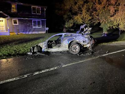 Burnt-up car on Romancoke Road in Stevensville.