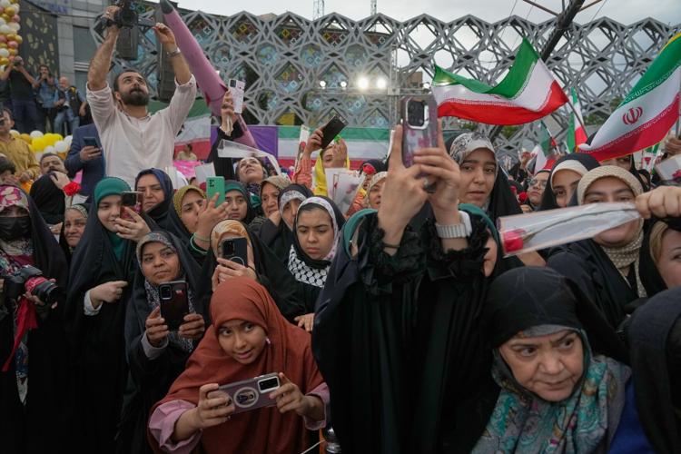 Photos of a mass wedding and a colorful missile at Tehran's 'Sacrifice for Iran' ceremony