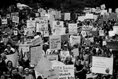 Fashion As Protest: How T-Shirt Slogans Influenced Historic Political Movements