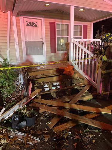 Car Crashes into Long Neck House