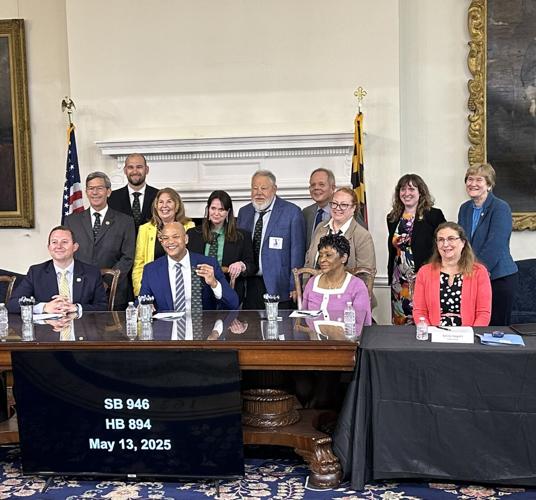 Moore Bat Bill Signing