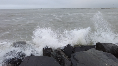 Wave Splashing On Rocks