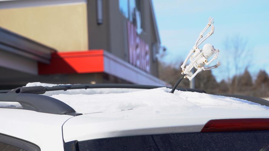 Snow on a car in Delaware