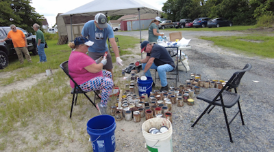 Volunteers Clear Site for Construction