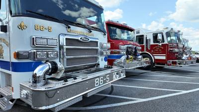 Fire Trucks Lined up at the Funeral Service for Thomas Berry III
