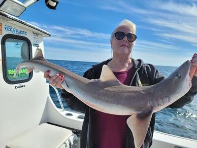 Fay Ganster with her record smooth dogfish. Photo by Captain John Forman