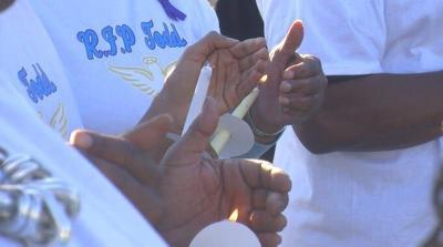 Candlelight Vigil Held for 8 Poisoned by Carbon Monoxide