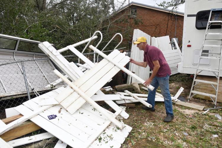 Isaias leaves trail of damage as it moves inland, in photos