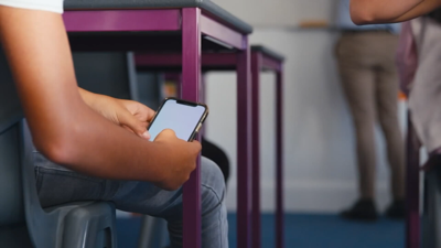 Kid using phone in class