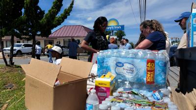 Volunteers Aid in Wake of Storm Damage