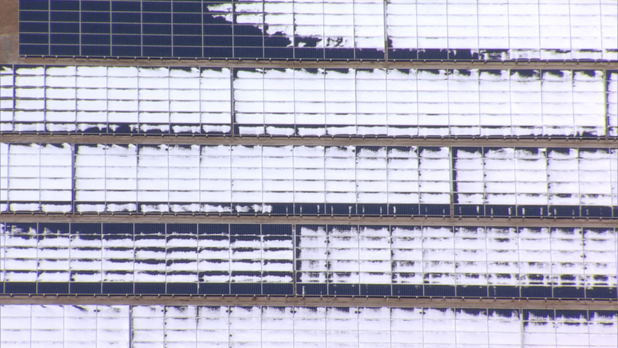Solar panels covered in snow