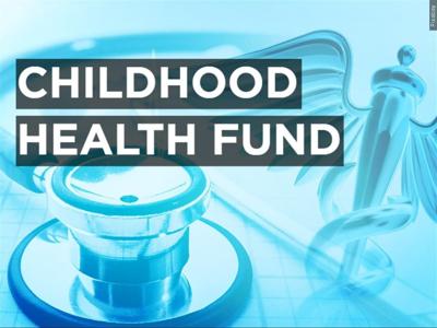 A caption that says "Childhood Health Fund" over a blue background with medical imagery, such as a stethoscope.