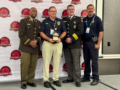 Fire Marshal Matthew Owens receiving lifetime achievement award in Annapolis.