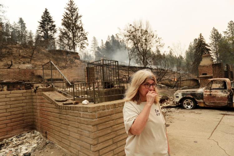 Photos show destruction from wildfires in Greece as blazes take hold in Europe and parts of the US