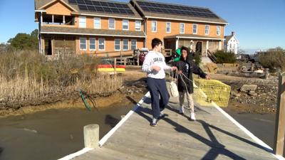 Students Carry Crab Pot