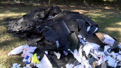 Pile of Roof Shingles Illegally Dumped Near Holly Lake Campsite