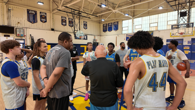 Wicomico HS basketball team huddle