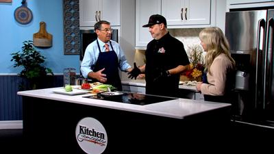 Steve, Joe and Lisa standing at the Kitchen Concepts Kitchen counter