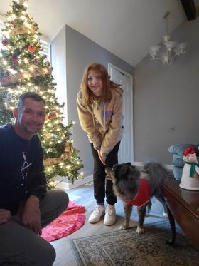 Madison, Murray, and Jason Warren with their Christmas tree.