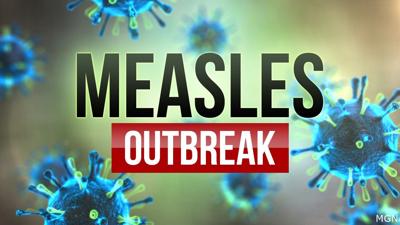 Measles outbreak graphic depicting the virus