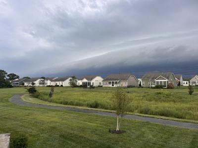 An outflow boundary forms a wall of clouds over a housing complex in the Five Points area of Lewes.