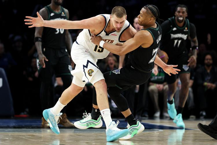 APTOPIX Nuggets Timberwolves Basketball