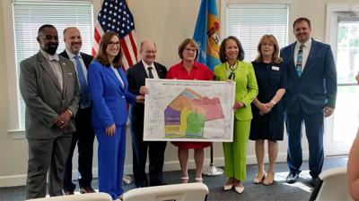 Delaware state officials hold the planned housing project for Laurel.