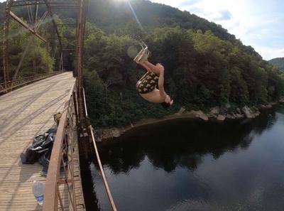 Austin Shaw diving off boards and bridges
