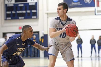 Men S Basketball Titans Remain Take Pac Win Over Thiel