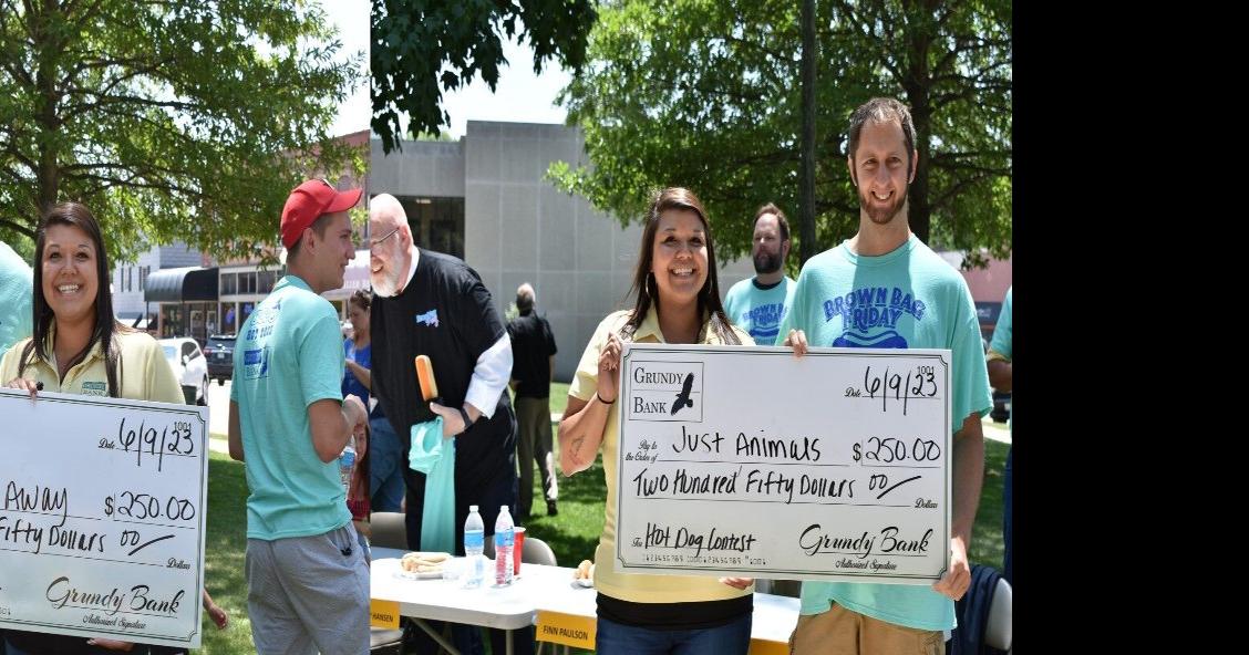 WCSJ/WJDK News Director & Grundy Co. States Attorney Win Hotdog Eating