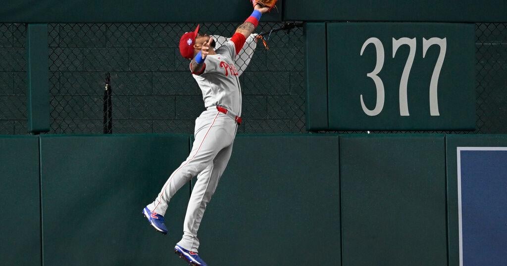 Phillies score 8 runs in the ninth inning and rally past the Nationals 14-9