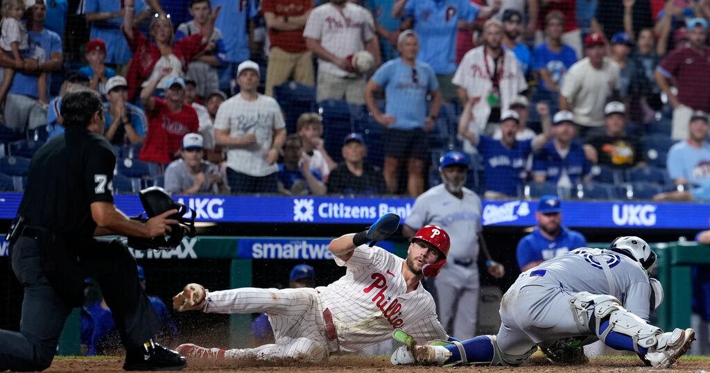 Toronto escapes 2 bases-loaded jams in the 9th to seal Blue Jays' win over Phillies